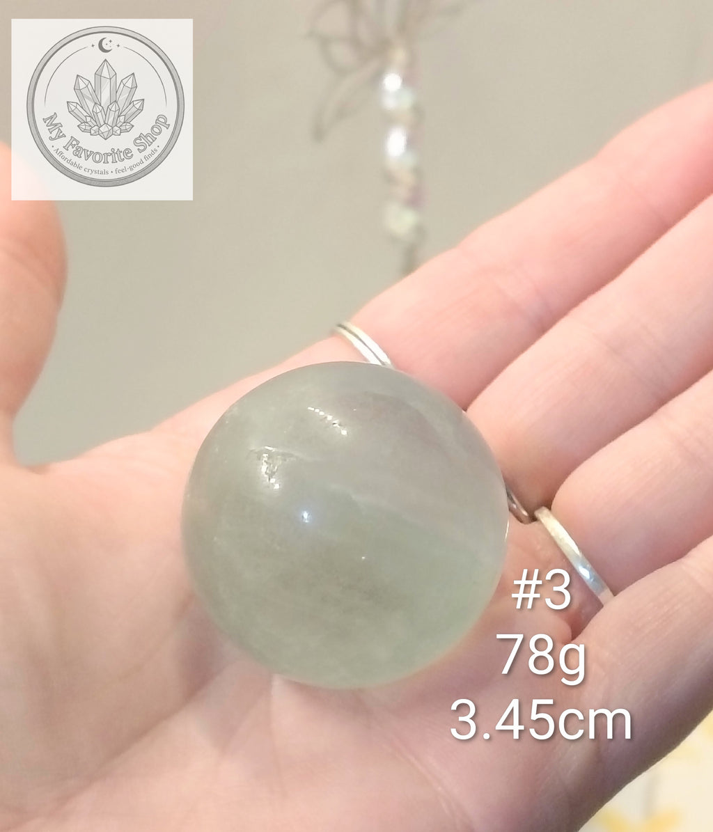 UV-Reactive Seafoam Green Fluorite Spheres
