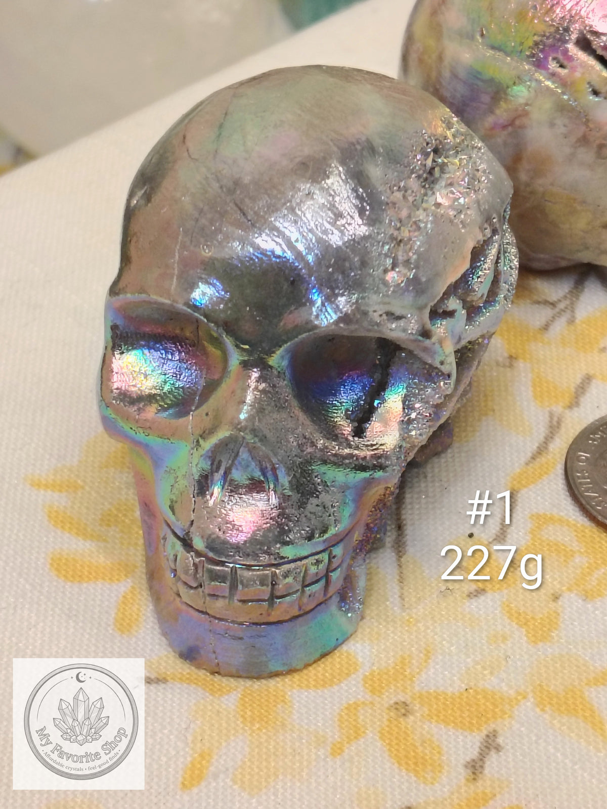 Aura Sphalerite Skull Carvings – Rainbow Shimmer