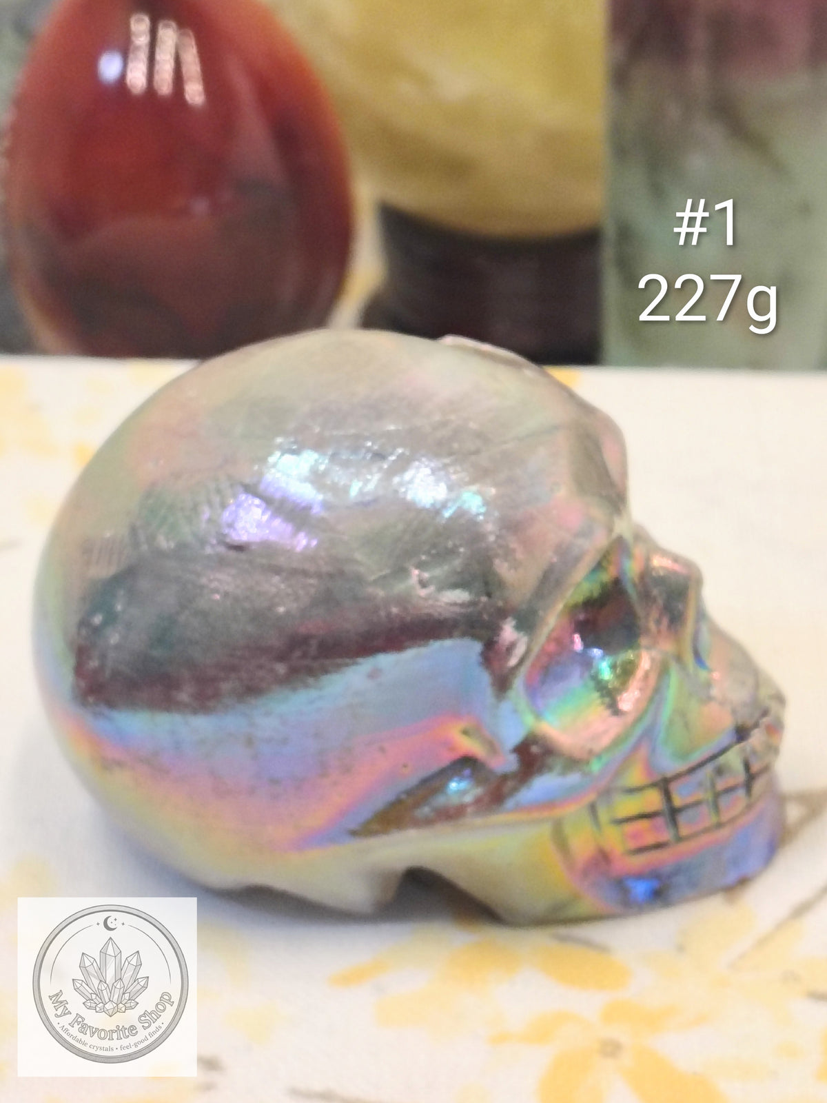 Aura Sphalerite Skull Carvings – Rainbow Shimmer