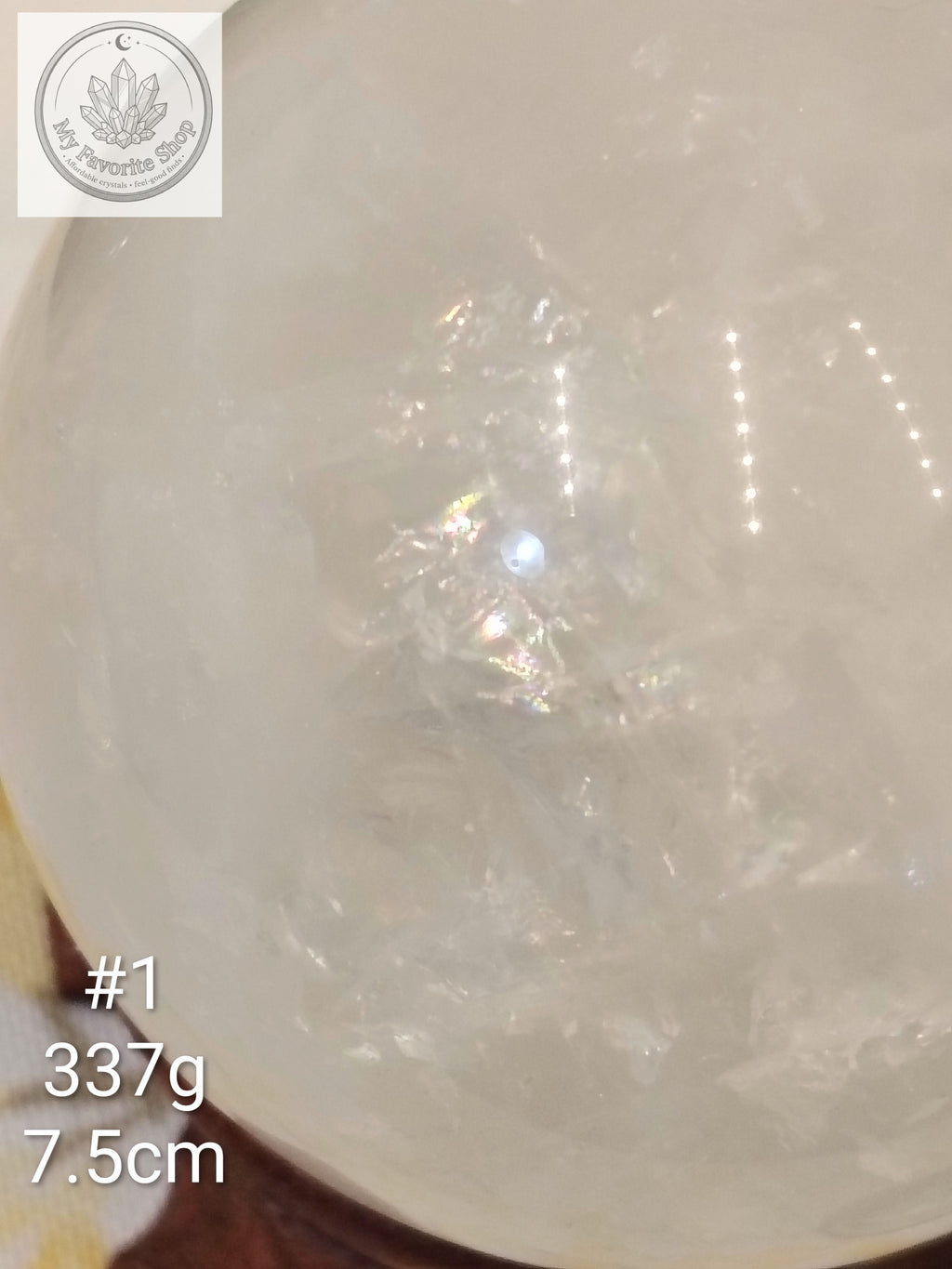 Snow Quartz Spheres with Internal Rainbow Shimmers