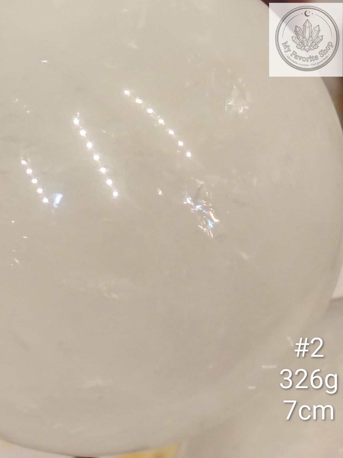 Snow Quartz Spheres with Internal Rainbow Shimmers