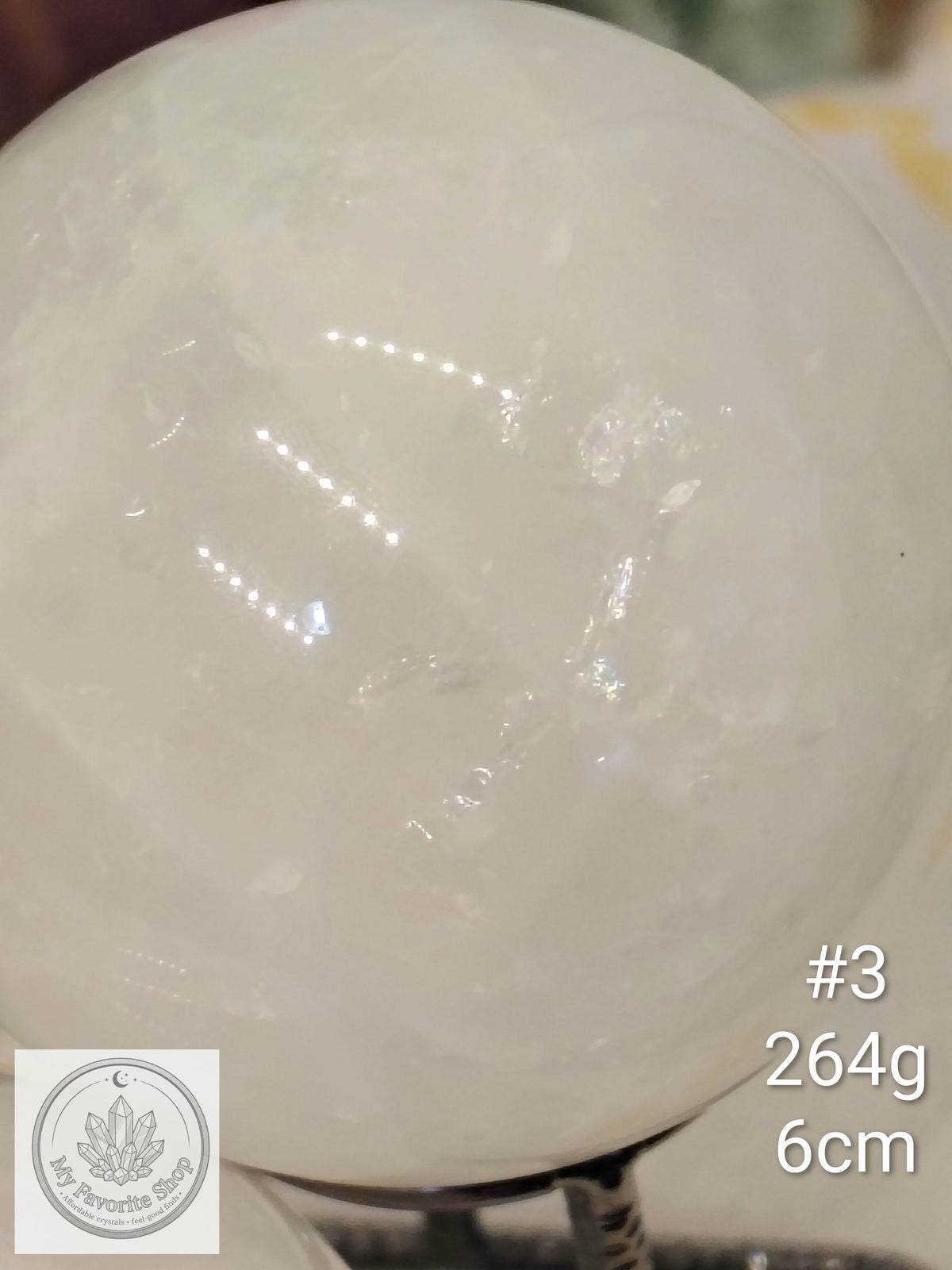 Snow Quartz Spheres with Internal Rainbow Shimmers