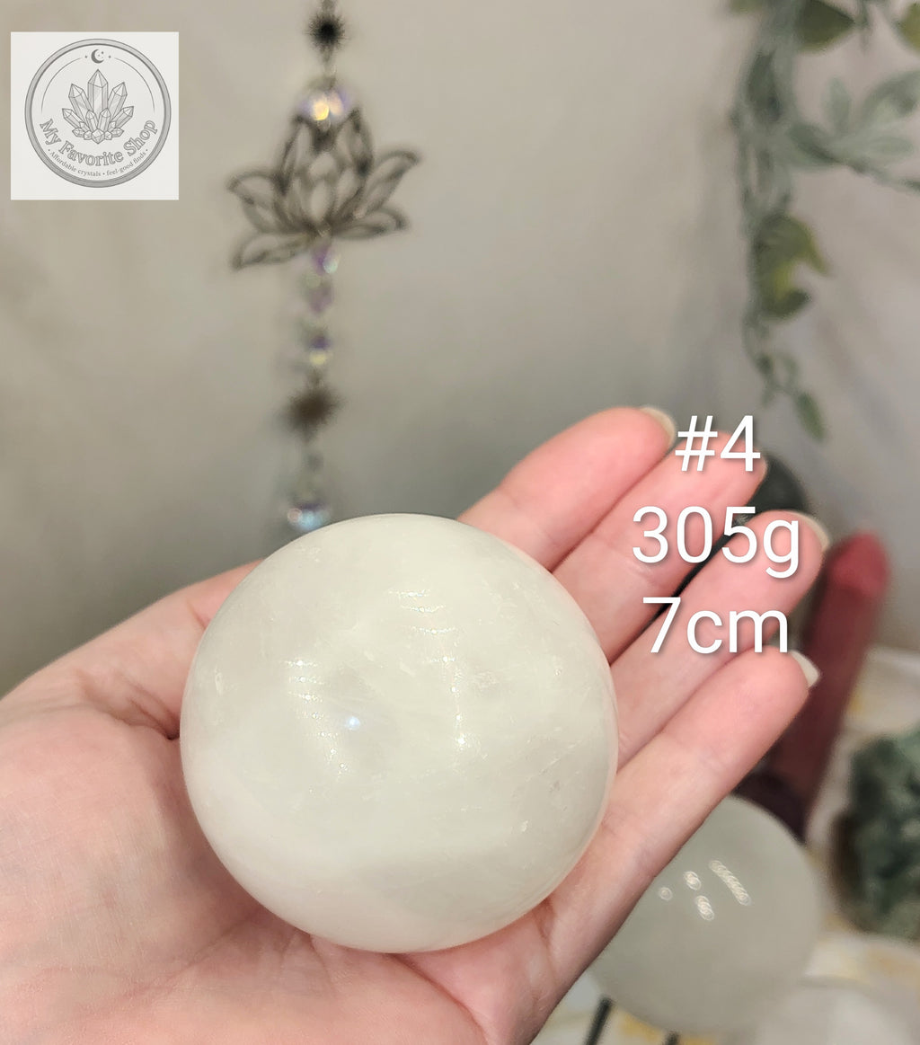 Snow Quartz Spheres with Internal Rainbow Shimmers